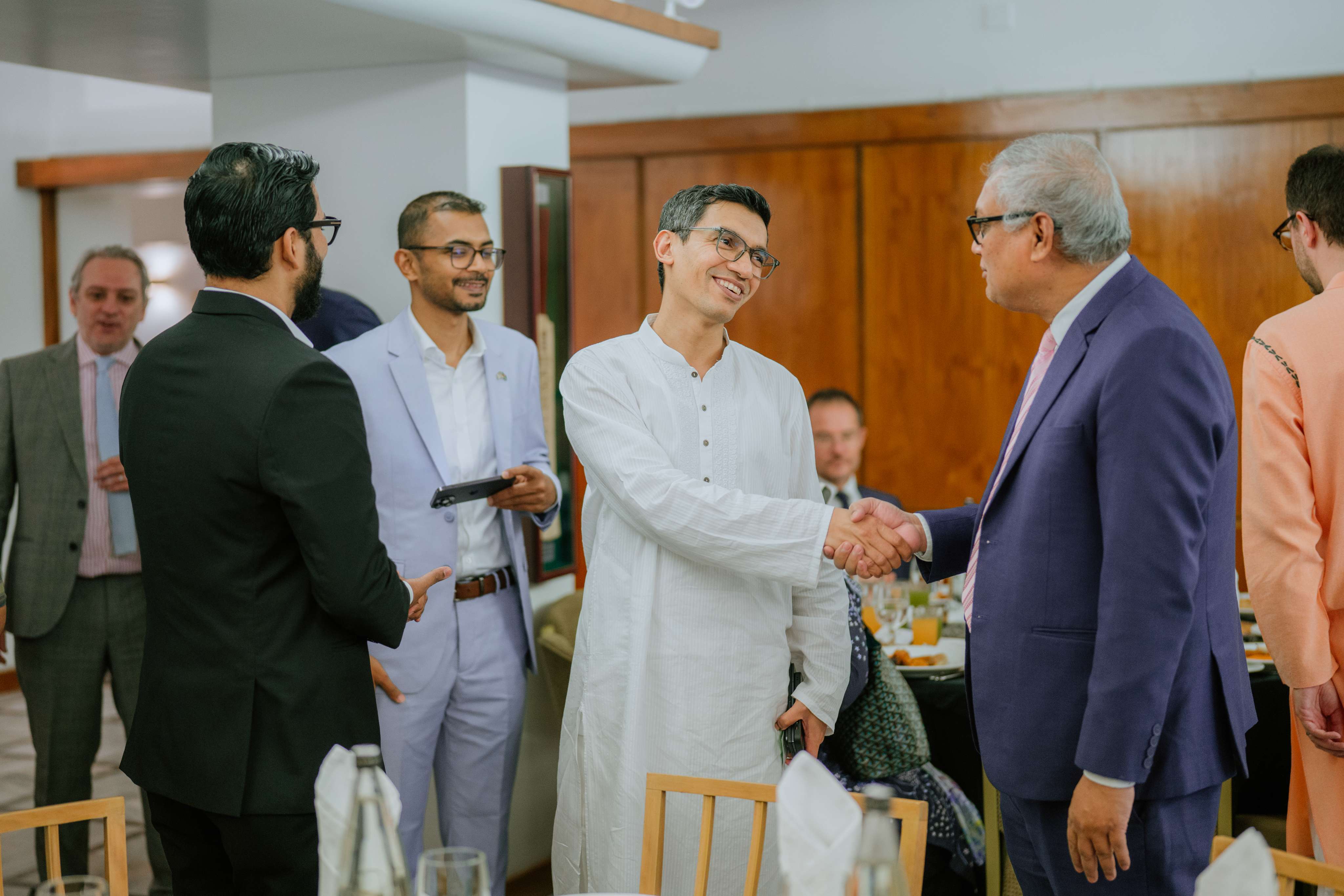 BBG members in discussion at the Iftar